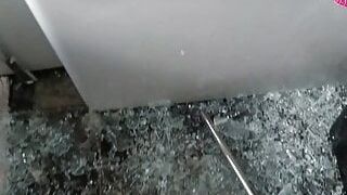 Porn scene ending in a smashing glass shower scene