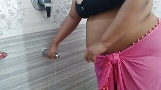 55-year-old Indian stepmom gets sexually excited and has sex with a water pipe in the bathroom - Desi Sex