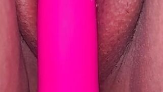 Red nails holding pussy with a vibration for orgasm