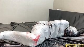 Fejira com Fetish girl mummification wrap