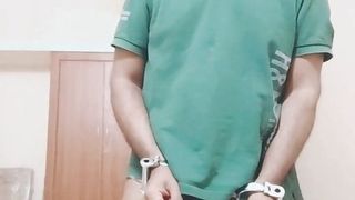 Handcuffed man in new chastity cage