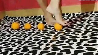 Feet, oranges and high heels