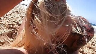 GERMAN BLONDE GIVES AN AMAZING OUTDOOR BLOWJOB ON THE BEACH