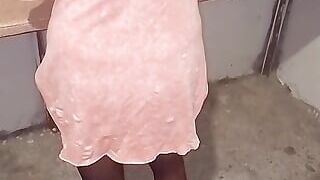 Turkish woman in pink dress leg nylon stockings