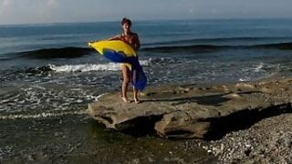 Dancing on Mediterranian Sea Beach with Yellow-Blue Shawl
