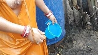 Indian wife bathing outside with boobs Indian