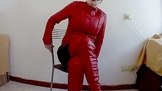 MILF in red leather masturbates crossed legs to orgasm
