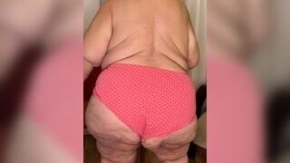 The highly large grandma dressed in her underpants