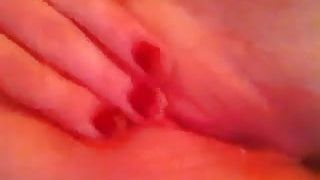 Wife rubs and slaps pussy