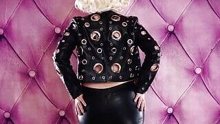 "Leather Tease: sexy leggings and fashion jacket. Curvy blonde Mistress Arya Grander. "