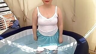 In the hot tub fully clothed wet look