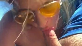 Excellent car blowjob from blonde milf in sunglasses