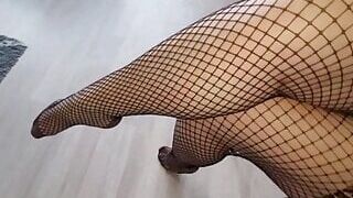 Toes caught in fishnets.